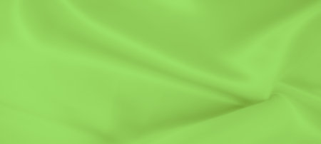 Blur - Soft, flowing bright green fabric with smooth, gentle folds creating a lush, vibrant texture. The light captures the satin-like surface, enhancing the elegance and movement of the material.の写真素材