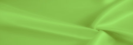 Blur - Bright green fabric with a soft, lustrous finish. The folds flow smoothly, catching light across the surface, creating a serene and luxurious appearance.の写真素材