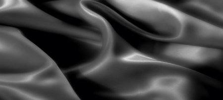 Blur the grayscale folds and soft textures of this fabric, where subtle shadows and gentle waves create a refined, sophisticated design that plays with light effortlessly.の写真素材