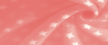 Blurred light pink fabric featuring a charming white star pattern, creating a soft, gentle texture....
