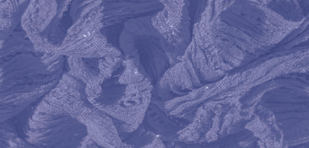 Blur: A close-up of lavender fabric with soft, folded layers and intricate woven patterns. The...
