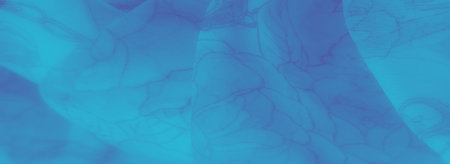 Blur of a flowing blue fabric adorned with faint floral and leaf outlines. The gentle pattern and...