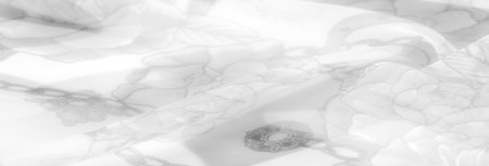 Blurred soft floral fabric design with grayscale roses and faint chains intertwined. The pattern is minimalist yet detailed, evoking a sense of elegance and refinementの写真素材