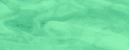 Blur - A green fabric with graceful floral designs and light textures creates a flowing, dreamy aesthetic. The intricate flower outlines appear subtly across the sheer fabric,の写真素材