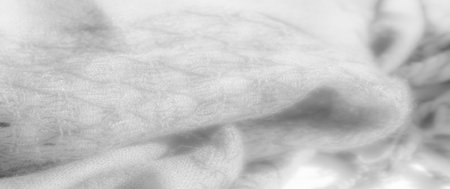 Blur brings out the layered textures of delicate white fabric, casting soft shadows within gentle folds. This calming design has a seamless, light quality that is elegant and serene.の写真素材