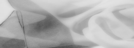 Blurred soft white fabric folds into light, flowing shapes, creating a gentle and serene texture. Its minimalist elegance and clean look make it suitable for high-end visual concepts.の写真素材