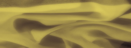 Blur of yellow fabric with subtle folds and a smooth, serene texture, capturing the essence of gentle warmth and softness, ideal for calm and cozy visualsの写真素材