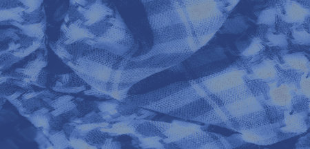 Blur - A blue fabric with intricate patterns and a soft, textured surface. The delicate folds and...