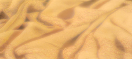 Blur of yellow fabric with subtle texture and organic folds. The warm hue and intricate woven...