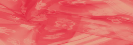 Blur, a stunning capture of pink fabric with white floral motifs. The layered folds and light...