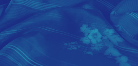 Blur fabric in vibrant blue tone with harmonious floral and linear patterns, creating a soft and...