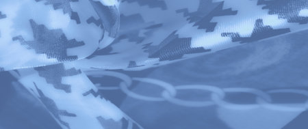 Blurred vibrant blue fabric adorned with layered houndstooth and chain details, creating a luxurious and smooth texture ideal for fashion and interior designs.の写真素材