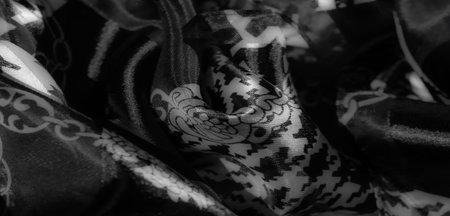 Blur - A soft, black and white fabric with a combination of houndstooth and decorative floral chain...