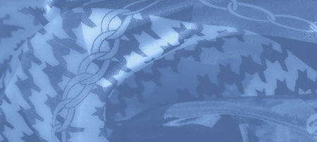 Blur - A stunning fabric piece showcasing houndstooth and chain-inspired motifs in varying shades of...