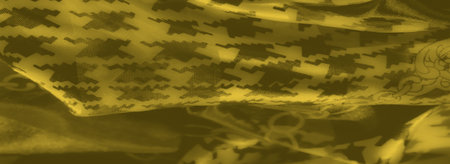Blur reveals a luminous yellow fabric with dynamic chain and zigzag patterns, blending traditional...