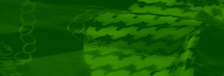 Blur of luxurious green fabric with layered abstract motifs and intricate chain-like patterns,...