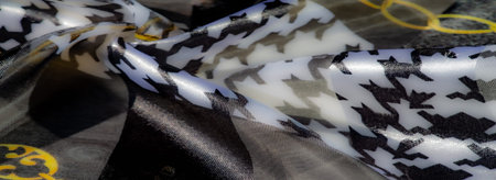 Blur of black and white textile with golden chain patterns, blending bold contrasts and luxurious...