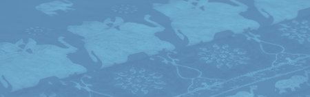 Blur of blue fabric with flowing lines and abstract patterns that evoke movement and elegance, ideal for modern backgrounds and artistic visuals.の写真素材