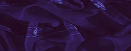 Blurred shot of soft purple fabric embellished with a harmonious blend of abstract and floral...
