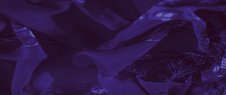 Blur effect on purple deep fabric featuring intricate floral and geometric patterns with soft textures, showing elegance and complexity.の写真素材