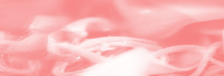 Blur Layers of shimmering pink fabric intricately intertwined, with frayed edges adding texture and character, making it a versatile background for creative projects.の写真素材