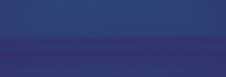 Blurred deep blue fabric with intricate folds and smooth texture, creating an abstract pattern. The...