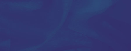 Blur, seamless blue fabric backdrop with intricate folds and rich tones. The smooth and flowing material adds a touch of elegance to any visual project or textile theme.の写真素材