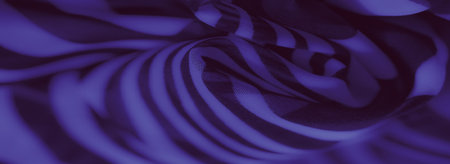 Blurred textured image of purple and black fabric with soft, undulating folds and layered patterns, emphasizing an aesthetic mix of bold contrasts and light gradients.の写真素材