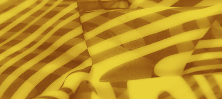 Blurred close-up of glowing yellow fabric with smooth abstract patterns. The seamless folds highlight texture and vibrant design, perfect for modern art and textile applications.の写真素材