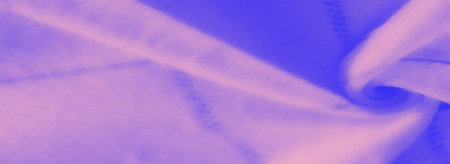 Blurred abstract texture of fabric in pink and blue hues, highlighting soft gradients and flowing patterns for a dreamy and stylish artistic effect.の写真素材