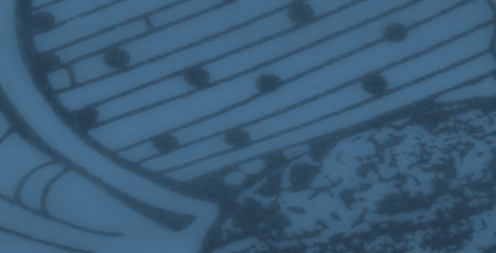 Blur, an intricate blue-toned fabric with ornate floral and paisley patterns, featuring subtle folds and a delicate texture that adds depth and dimension.の写真素材