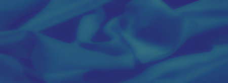 Blur of abstract blue fabric with dynamic folds and gradients. Light and shadow interplay enhances its fluidity, creating a modern and minimal aesthetic.の写真素材