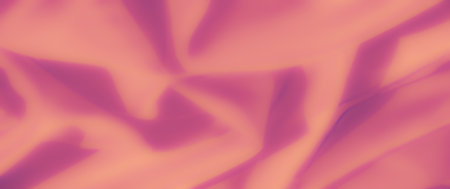 Blurred soft folds of light peach and purple fabric create a dreamy and abstract texture. The smooth ripples evoke elegance and serenity, ideal for backgrounds or designs.の写真素材