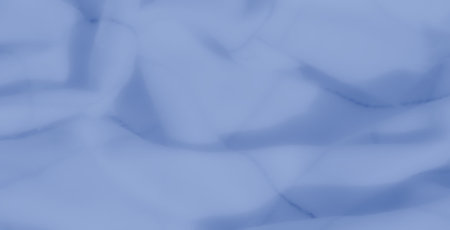 Blur - This abstract image captures smooth folds in blue fabric with fine, soft texture. The gentle...