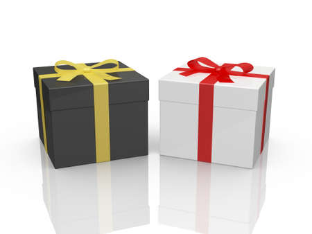 Black and white gift boxes with red and yellow ribbon, isolated on white background.の写真素材