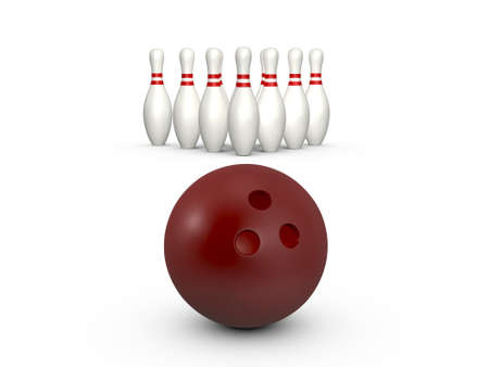 Bowling ball ready to hit skittle, isolated on white background.の写真素材
