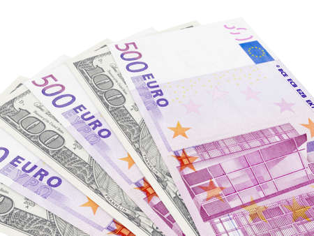 Five hundred euro bills and one hundred dollar bills on white background.の写真素材