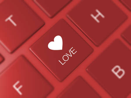 Love key and heart icon on red blurry keyboard.の写真素材