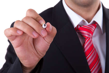 Businessman writing with pen or marker, isolated on white background.の写真素材