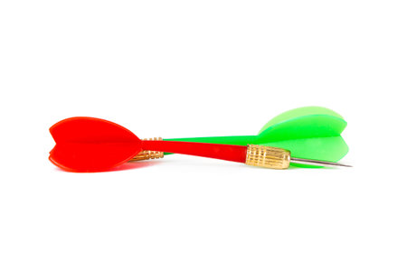Plastic red and green dart arrows, isolated on white background.