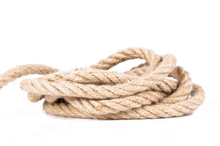Heap of rope, isolated on white background.の写真素材