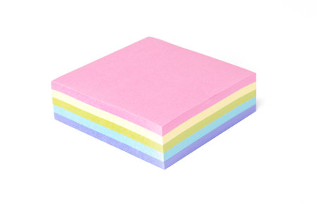 Multi colored sticky post it notes, isolated on white background.