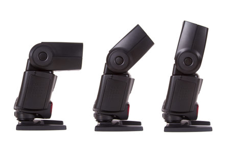 Electronic external speedlights with different angles, side view, isolated on white background.の写真素材