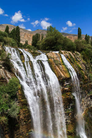 Waterfall on blue clear sky.の写真素材