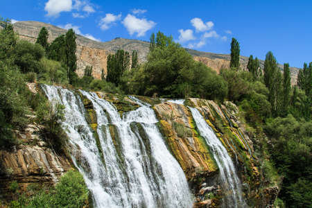 Waterfall on blue clear sky.の写真素材