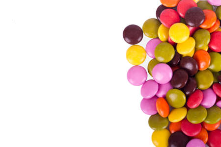 Colorful sugar candies with copy space, isolated on white background.の写真素材