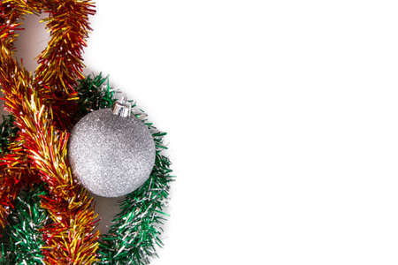 White christmas ball ornament with tree branch, isolated on white .の写真素材