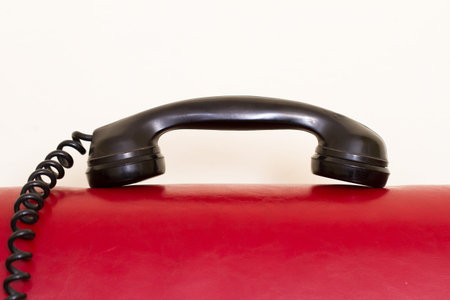 Receiver of black vintage phone.