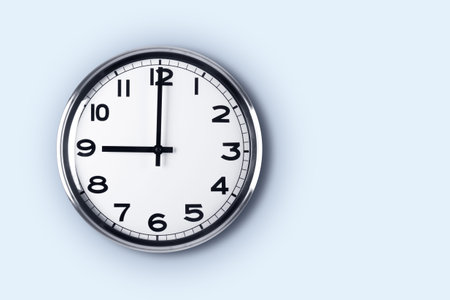 Time concept. Close up view of clock on wall with copy space, time to work.