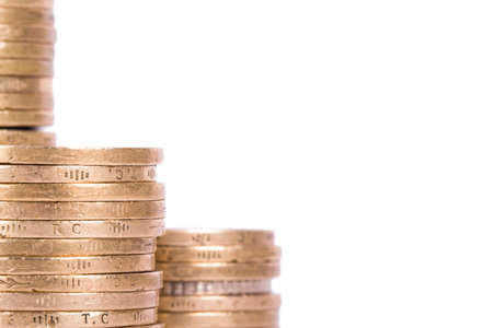 Close up view of arranged coins, isolated on white background.の写真素材